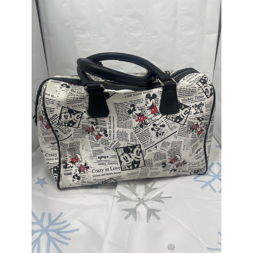 Disney parks Micky and Minnie newspaper satchel